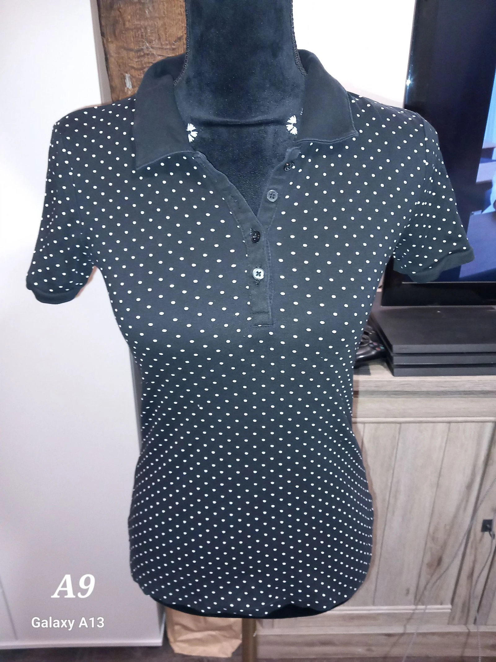 Polo noir à pois blancs C&A – Taille XS (Très bon état)